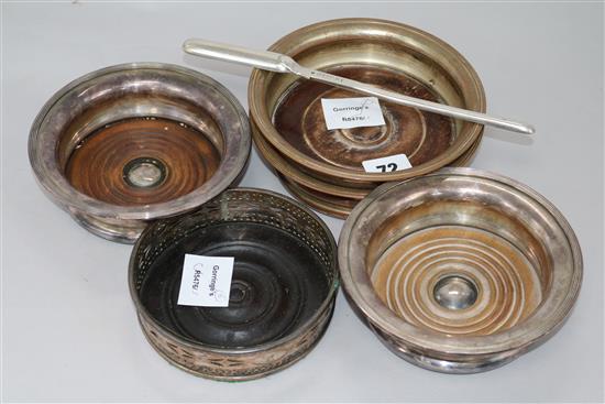 A pair of Sheffield plated coasters, one other, a pair of nickel plated coasters and a plated marrow scoop (6)